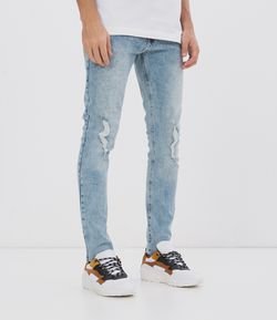 Calça Jeans Skinny Marmorizada com Rasgos 