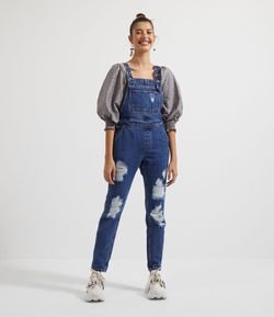 Macacão Jeans Longo com Ilhós e Puídos 