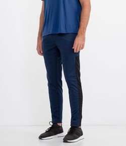 Calça Esportiva em Helanca Liso com Recorte Lateral 