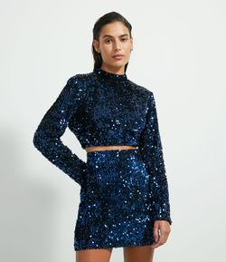 Blusa Cropped com Gola Alta Manga Longa em Malha de Paetê e Zíper nas Costas