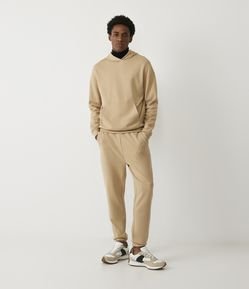 Calça Jogger em Moletom com Cós Elástico e Bolsos