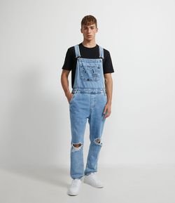 Jardineira Longa Jeans com Bolso Frontal Estampado