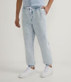 Calça Slim em Jeans Marmorizado com Cós Elástico