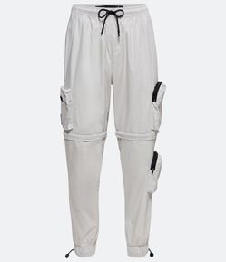 Calça Jogger Vira Bermuda com Bolsos Cargo