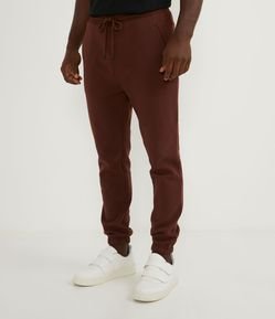 Calça Jogger em Moletom com Cós Elástico e Bolsos