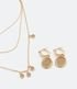Imagem miniatura do produto Conjunto Pendiente y Collar Capas en Metal con Detalles en Brillos Dorado 1