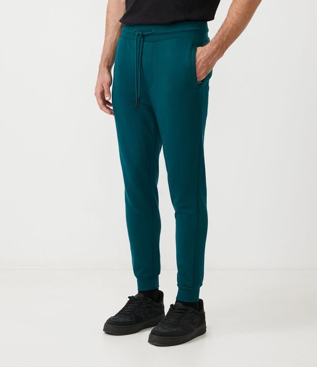 Calça Jogger em Moletom com Cós Elástico e Bolsos