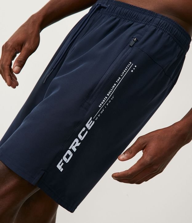 Bermuda Deportiva con Lettering Lateral Reflectante Azul Oscuro 5
