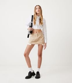 Saia Curta em Sarja com Barra a Fio e Forro de Bolso Aparente