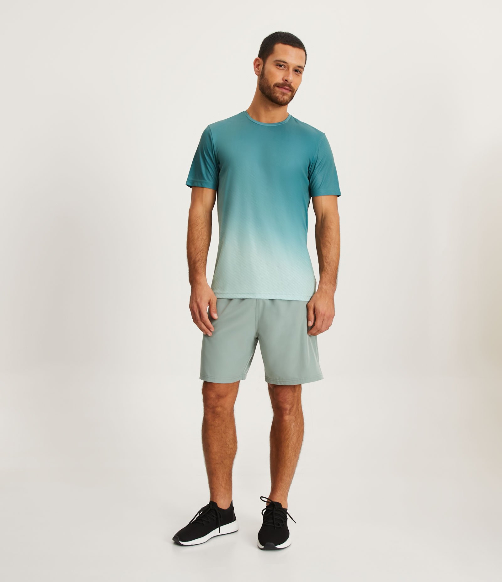 Bermuda Esportiva com Laser Cut e Bolsos com Zíper Verde Claro 1