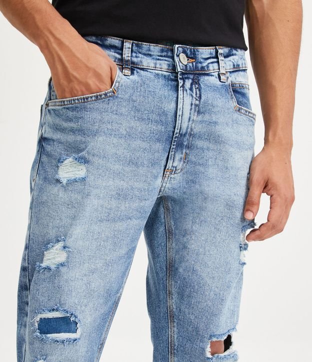 Calça Skinny Cropped Jeans com Rasgos Puídos e Barra Dobrada Azul 4