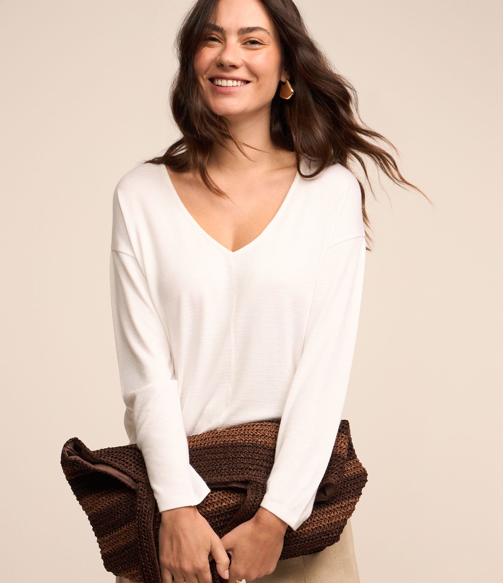 Blusa em Meia Malha Texturizada com Decote V Branco 1