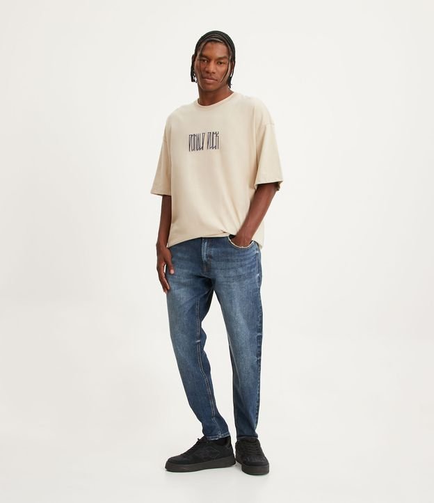 Calça Slim Standard Jeans com Bolsos e Puídos Azul Médio 1