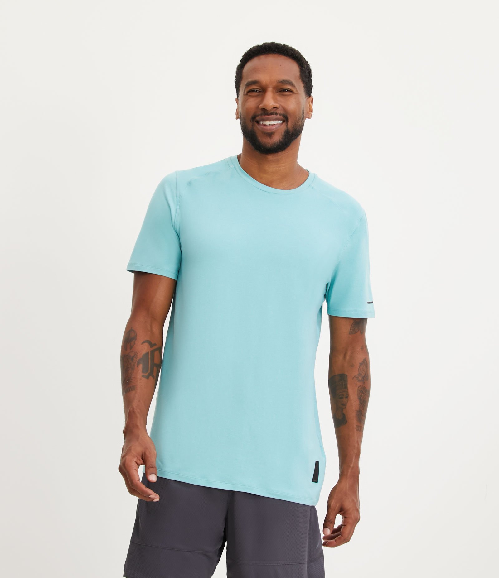 Camiseta Regular Esportiva em Tecnologia Dry com Etiqueta na Barra 1