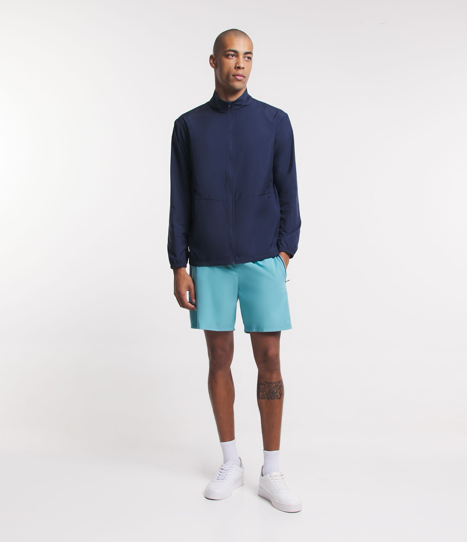 Bermuda Esportiva com Blocos de Cor e Bolsos com Zíper Azul Turquesa 1
