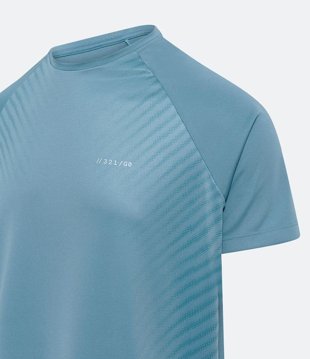 Camiseta Esportiva em Dry Fit com Cava Raglan e Listras Laterais Azul Mineral 6