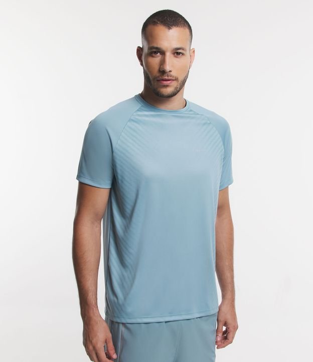 Camiseta Esportiva em Dry Fit com Cava Raglan e Listras Laterais Azul Mineral 1