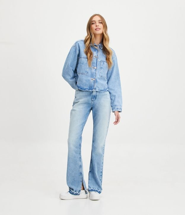 Calça Bootcut Jeans com Barra Desfiada e Fenda Azul 1
