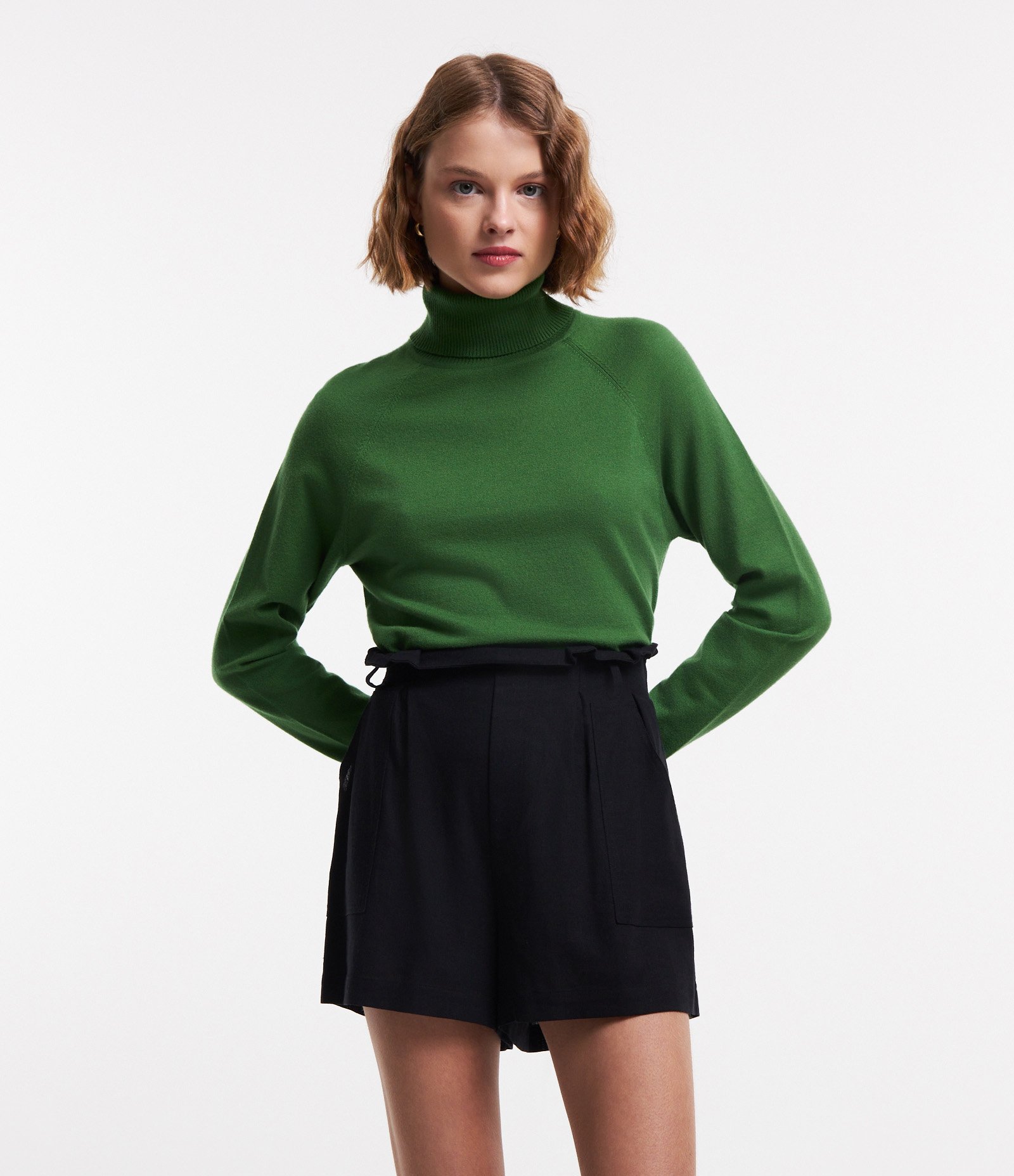 Blusa em Tricô com Gola Alta e Manga Longa 1