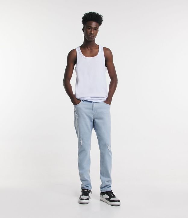 Calça Slim Jeans Delavê com Pequenos Puídos Azul Claro 1