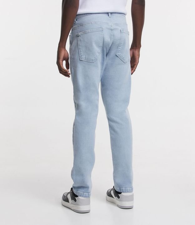 Calça Slim Jeans Delavê com Pequenos Puídos Azul Claro 3