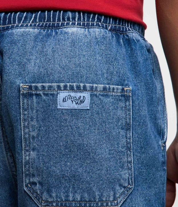 Bermuda Jeans com Cós Elástico Bolsos e Etiqueta Aplicada Azul Médio 5