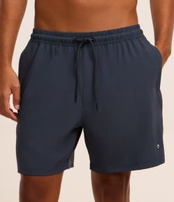 Bermuda com Bolsos e Etiqueta Emborrachada na Barra