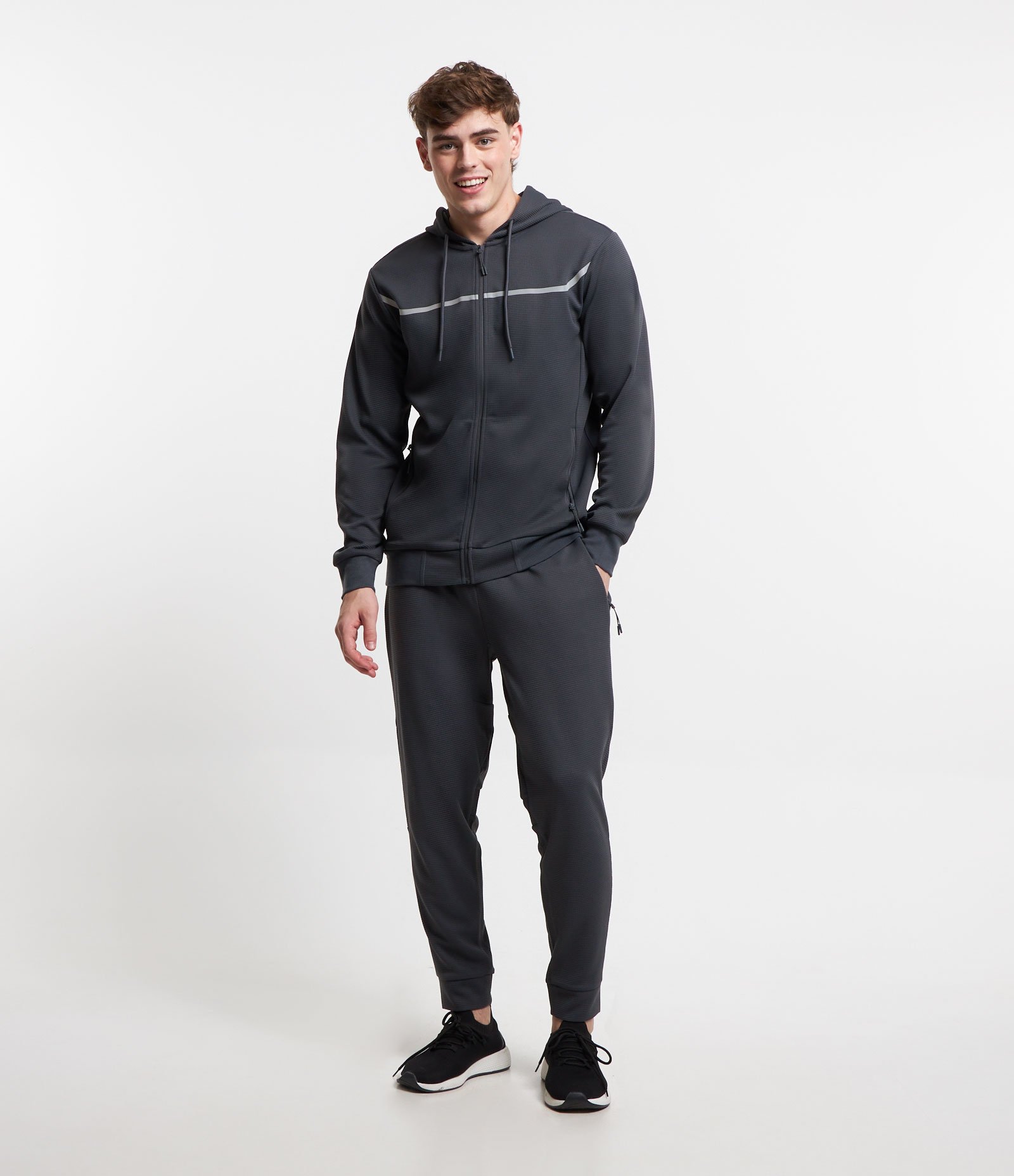 Calça Esportiva em Tecido Texturizado com Zíper nos Bolsos 1