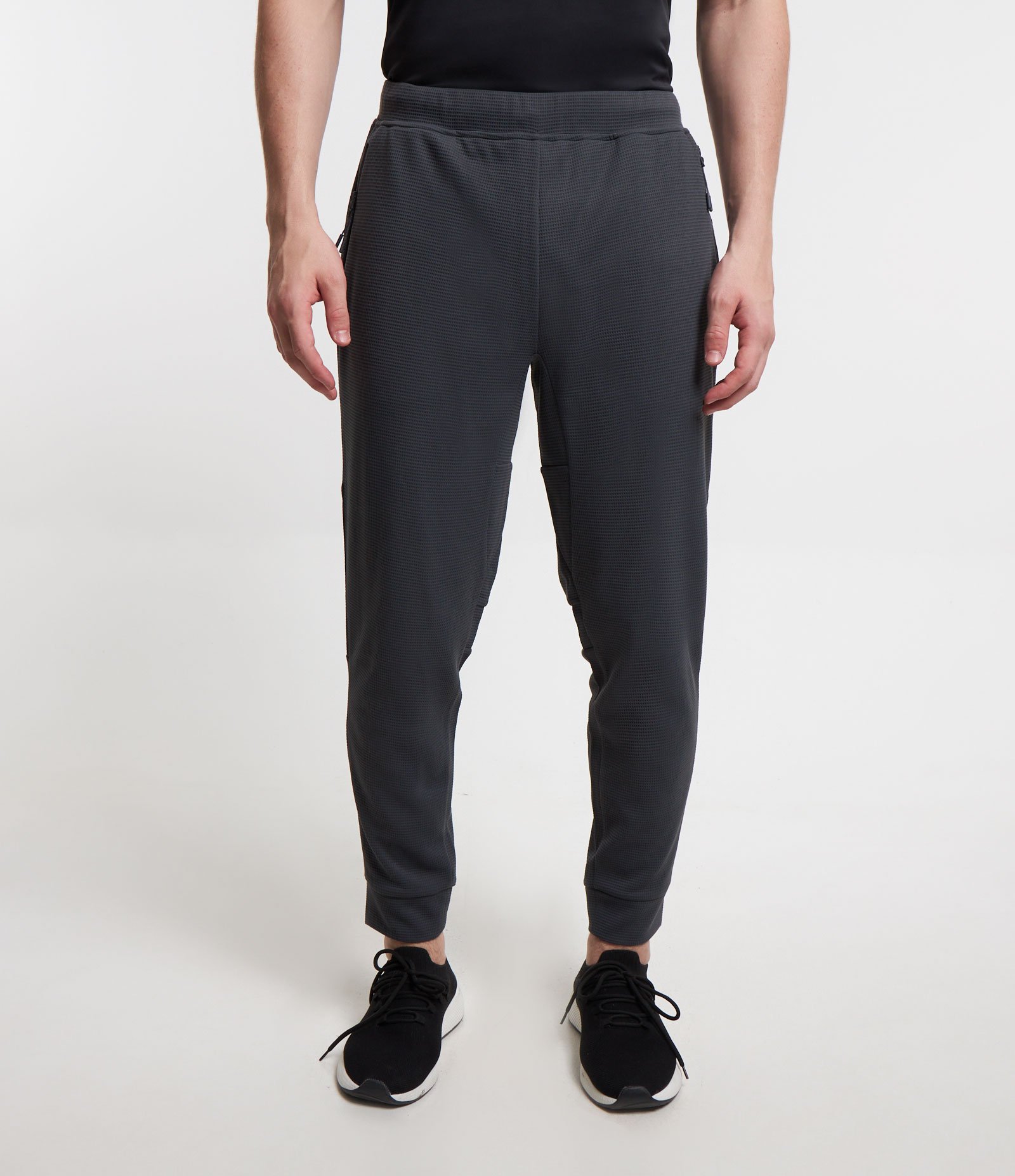Calça Esportiva em Tecido Texturizado com Zíper nos Bolsos 2