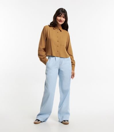 Calça Pantalona em Jeans com Pregas e Bolsos Calça Pantalona em Jeans com Pregas e Bolsos