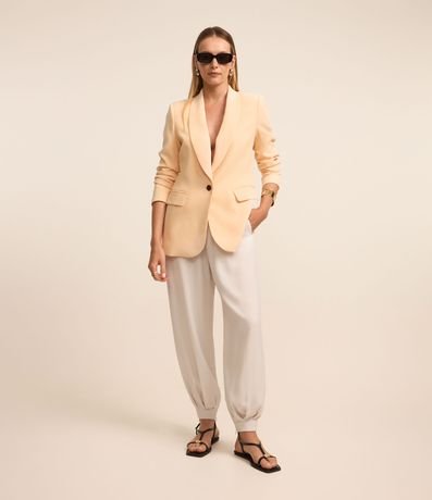 Calça Aladim Alfaiatada com Pregas na Barra Calça Aladim Alfaiatada com Pregas na Barra