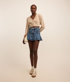Mini Saia em Jeans com Pala Larga e Babado na Barra