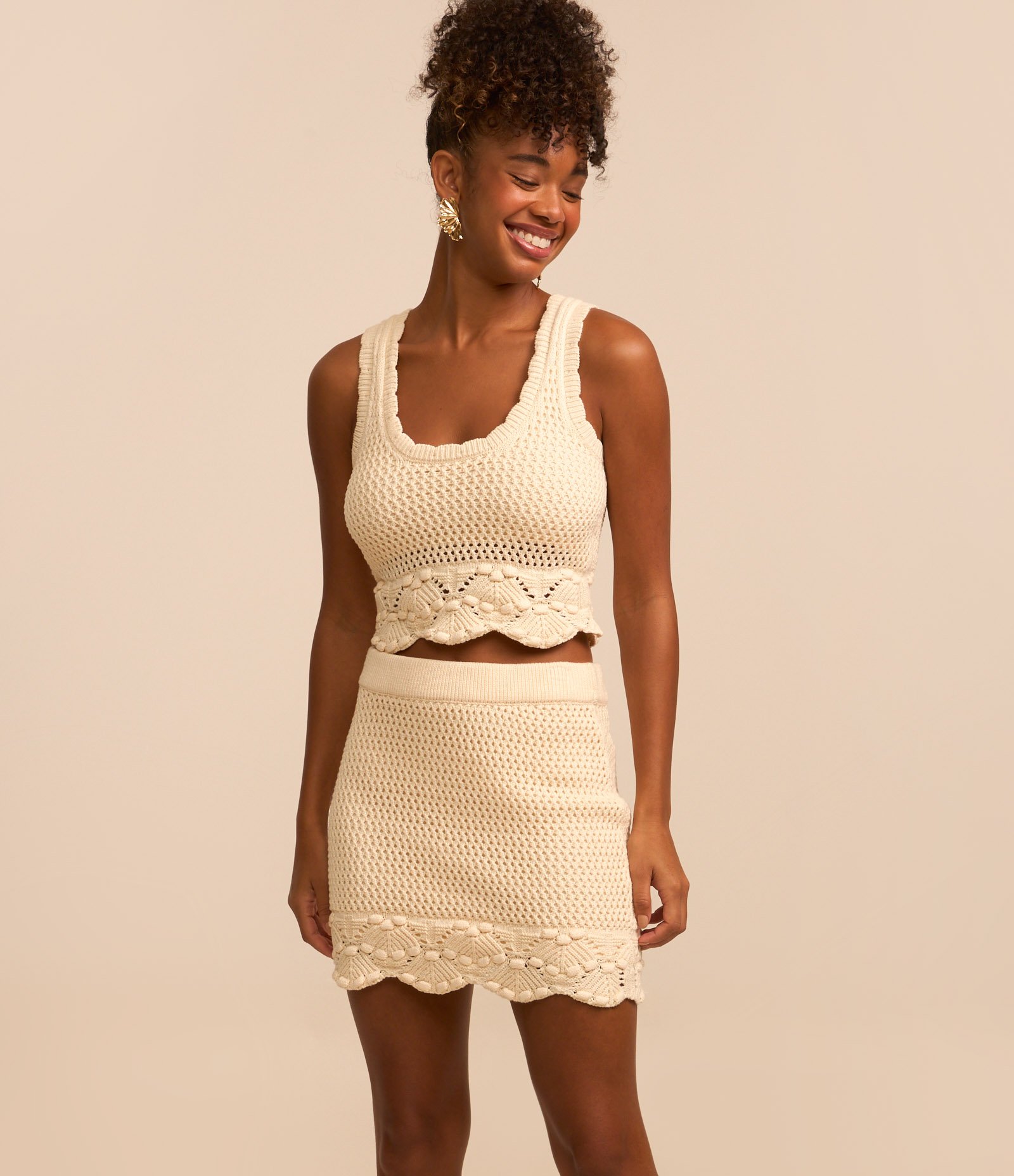 Saia Curta em Tricô com Detalhe na Barra Bege 2