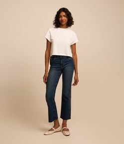 Calça Flare Cropped Jeans e Barra com Corte a Fio