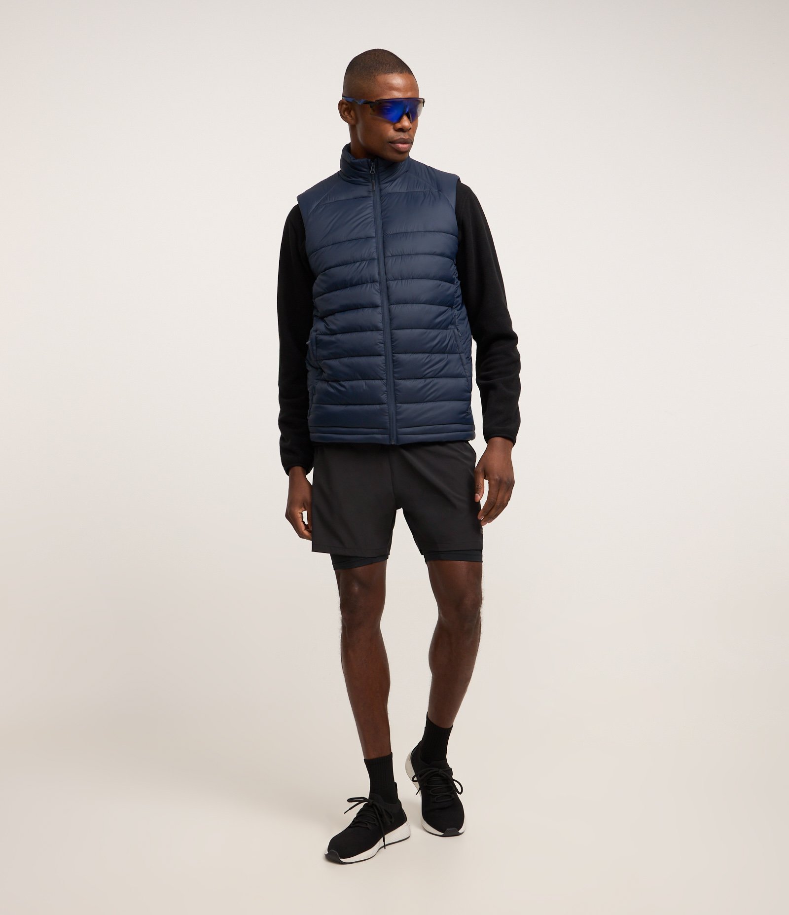 Colete Puffer Esportivo com Gola Alta e Gomos Azul Marinho 2