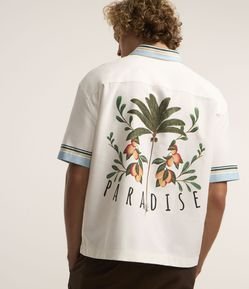 Camisa Boxy com Listras e Bolso Floral