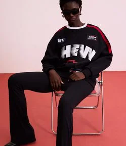 Calça Flare em Ponto Roma