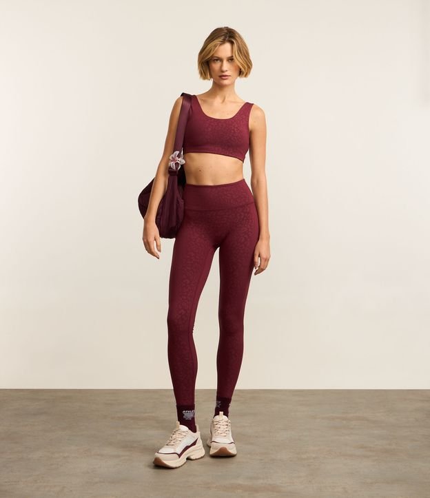 Calça Legging Esportiva em Microfibra Texturizada Animal Print Onça