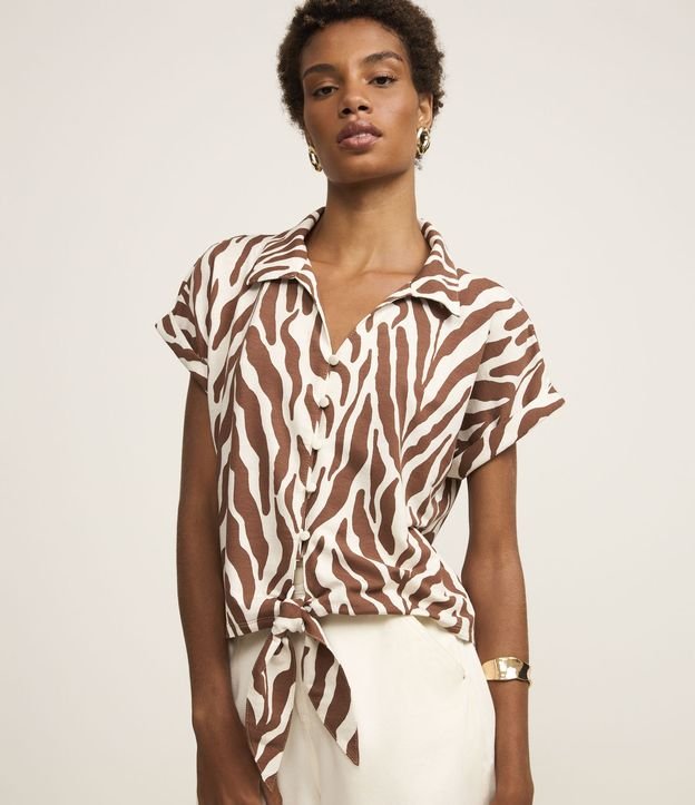 Cor: Marrom/Branco | Tamanho: P