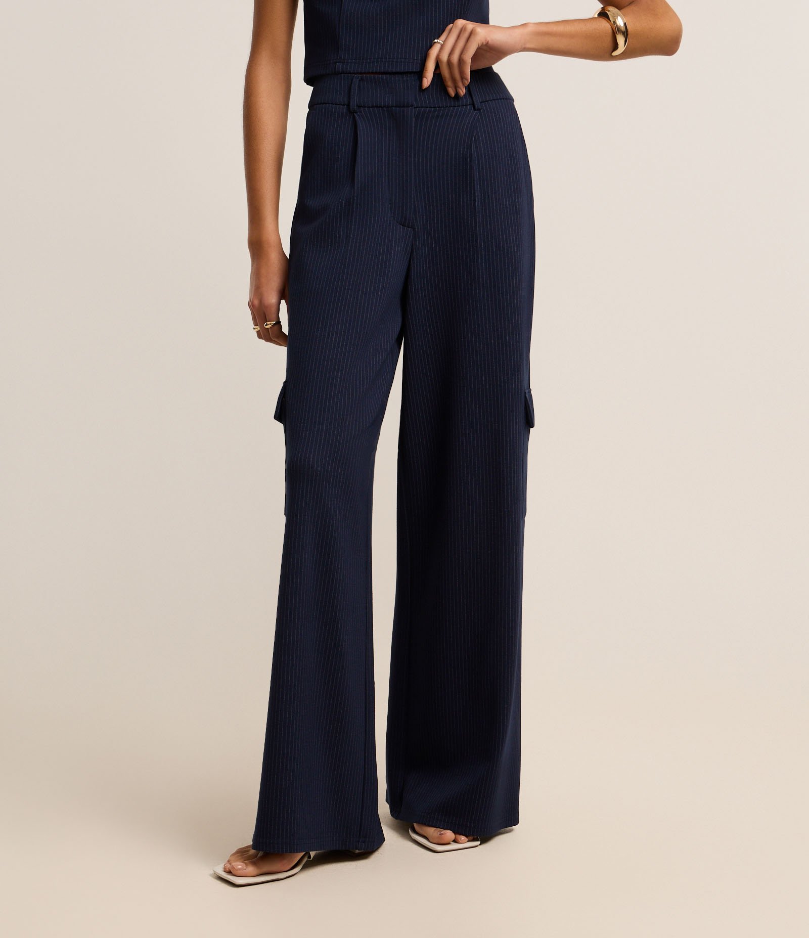 Calça Reta Cintura Baixa em Ponto Roma com Listras de Fio Tinto Azul Marinho 4