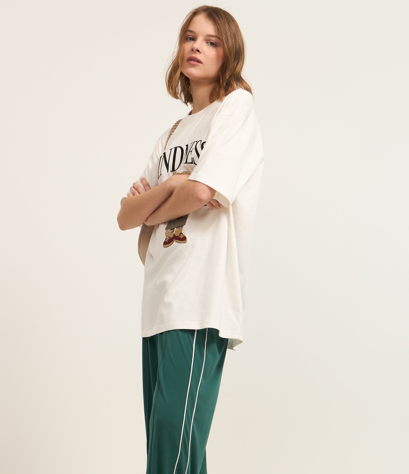 Calça Reta em Helanca e Friso Contrastante nas Laterais Verde 3