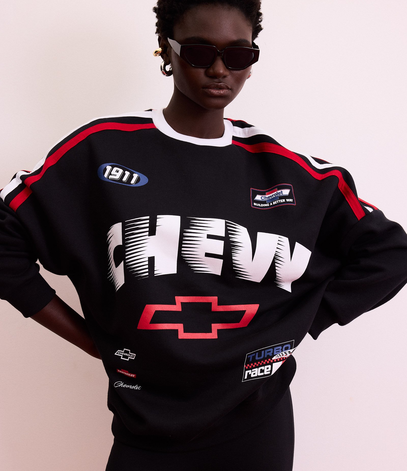 Casaco em Moletom com Viés Contrastante e Estampa Chevrolet Preto 1