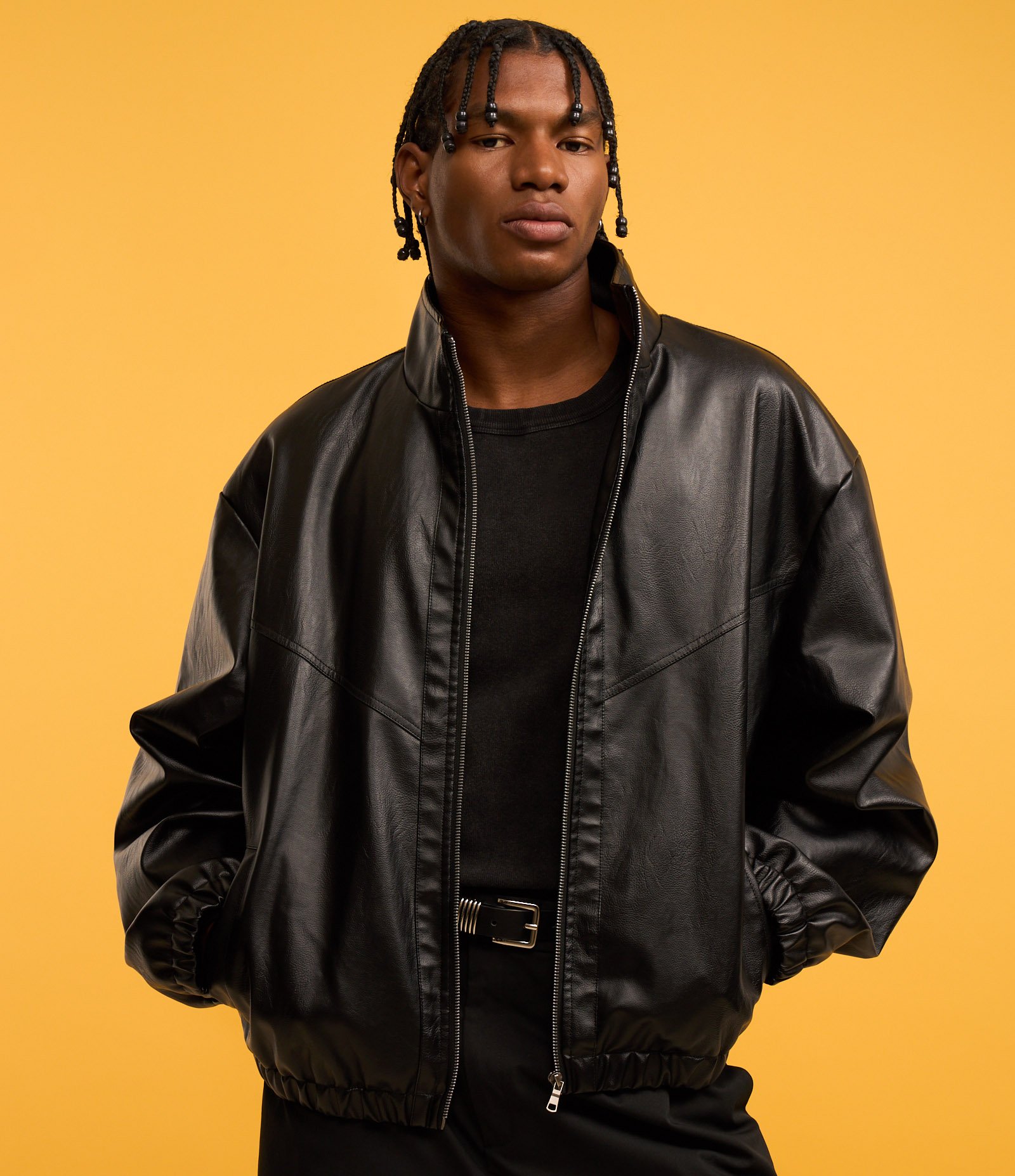 Jaqueta Boxy em Material Sintético com Gola Alta e Recortes Preto 7