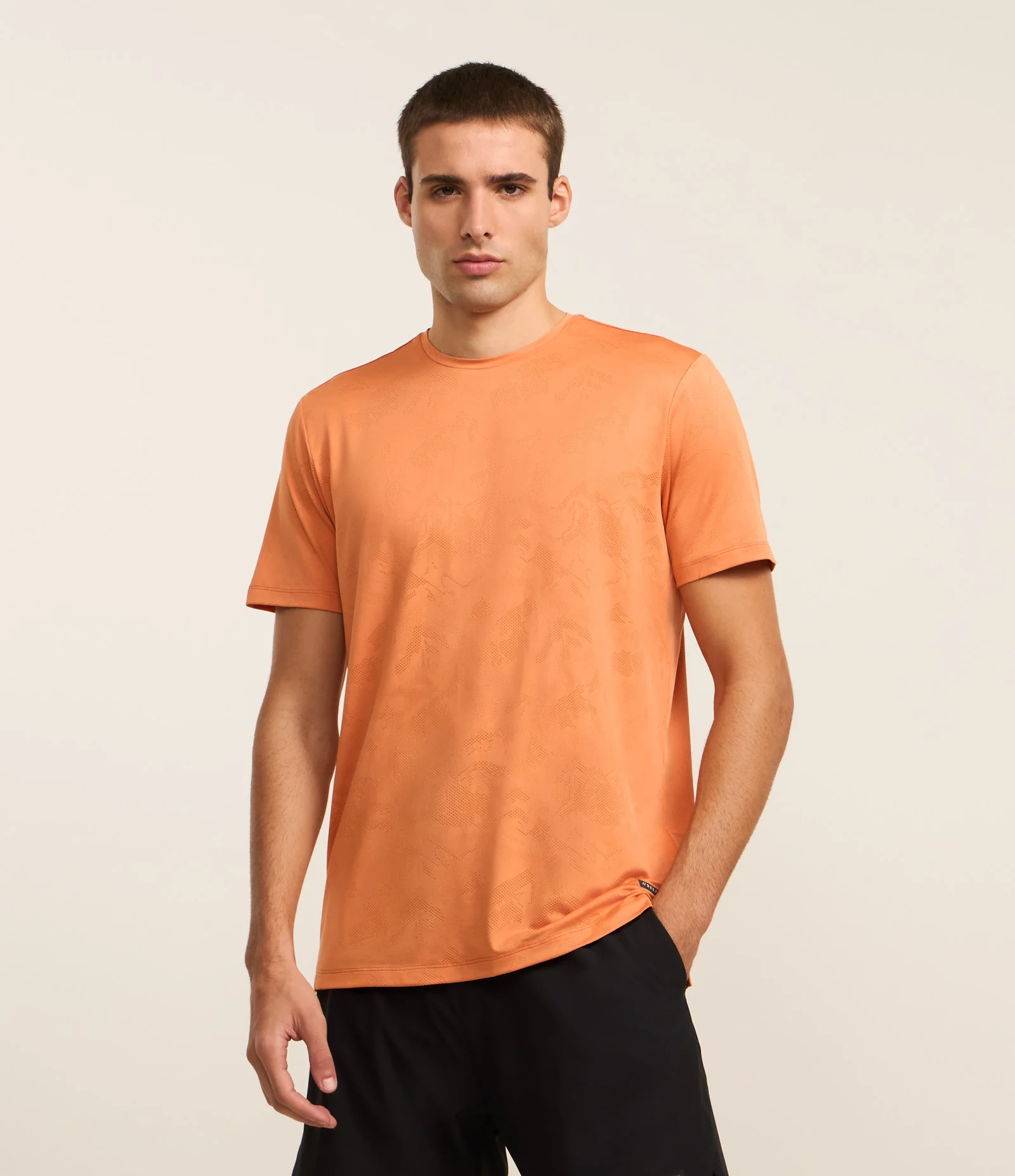 Camiseta Esportiva em Tecnologia Dry com Estampa Jacquard Laranja 1