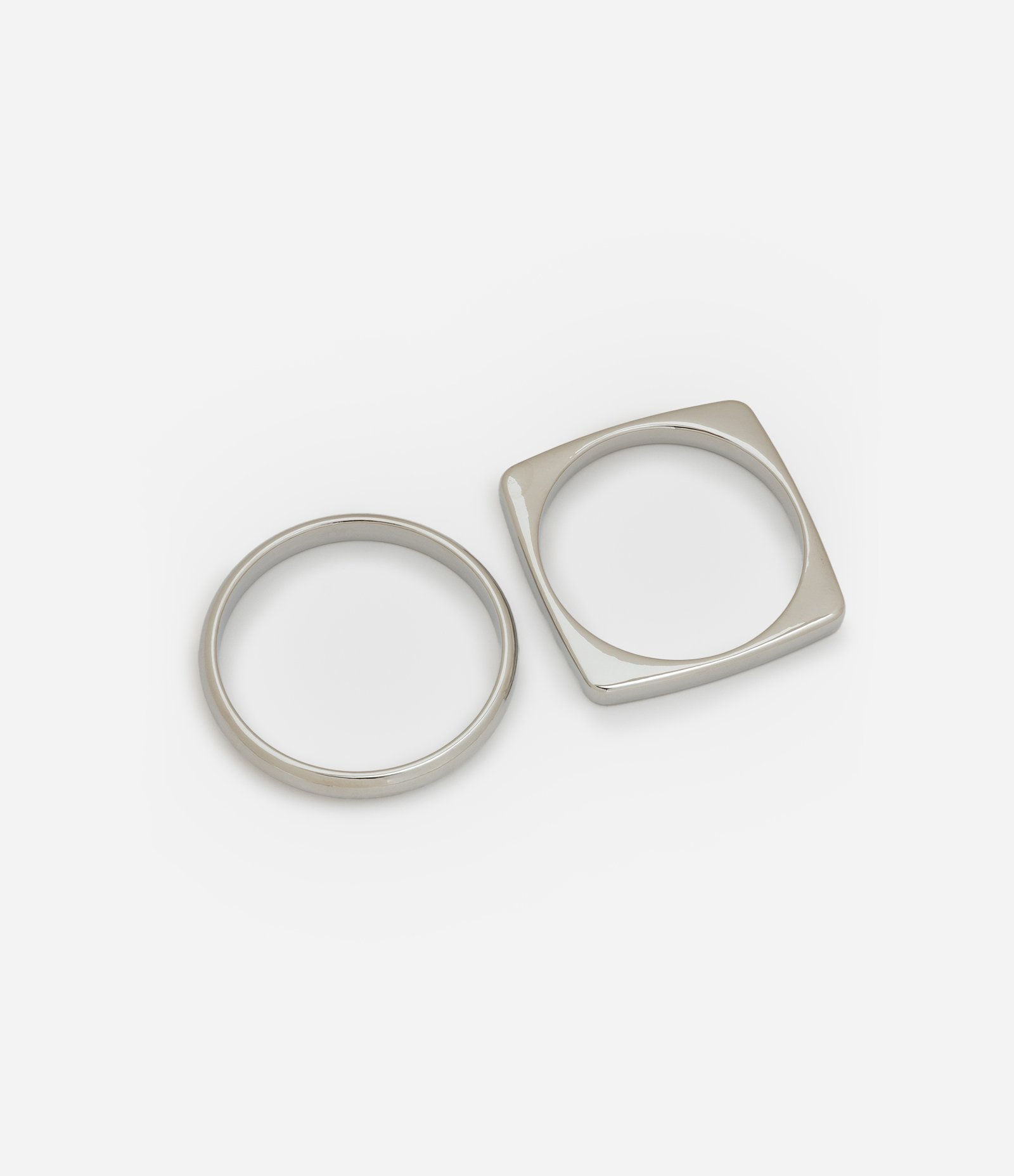 Kit 02 Braceletes em Plástico com Formatos Geométricos Prata 2