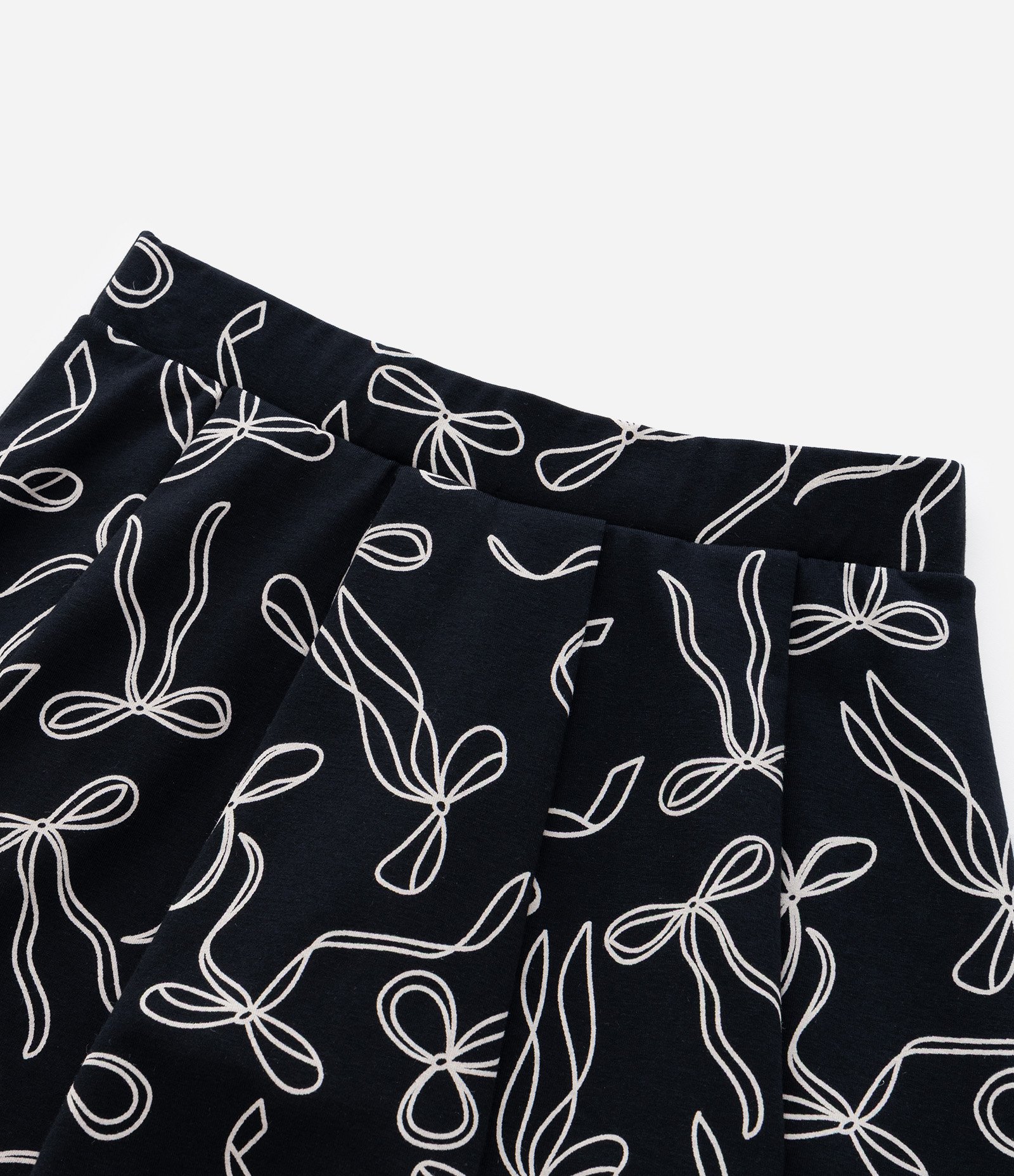 Short Saia Infantil com Pregas e Estampa Lacinhos - Tam 5 a 14 Anos Preto 3