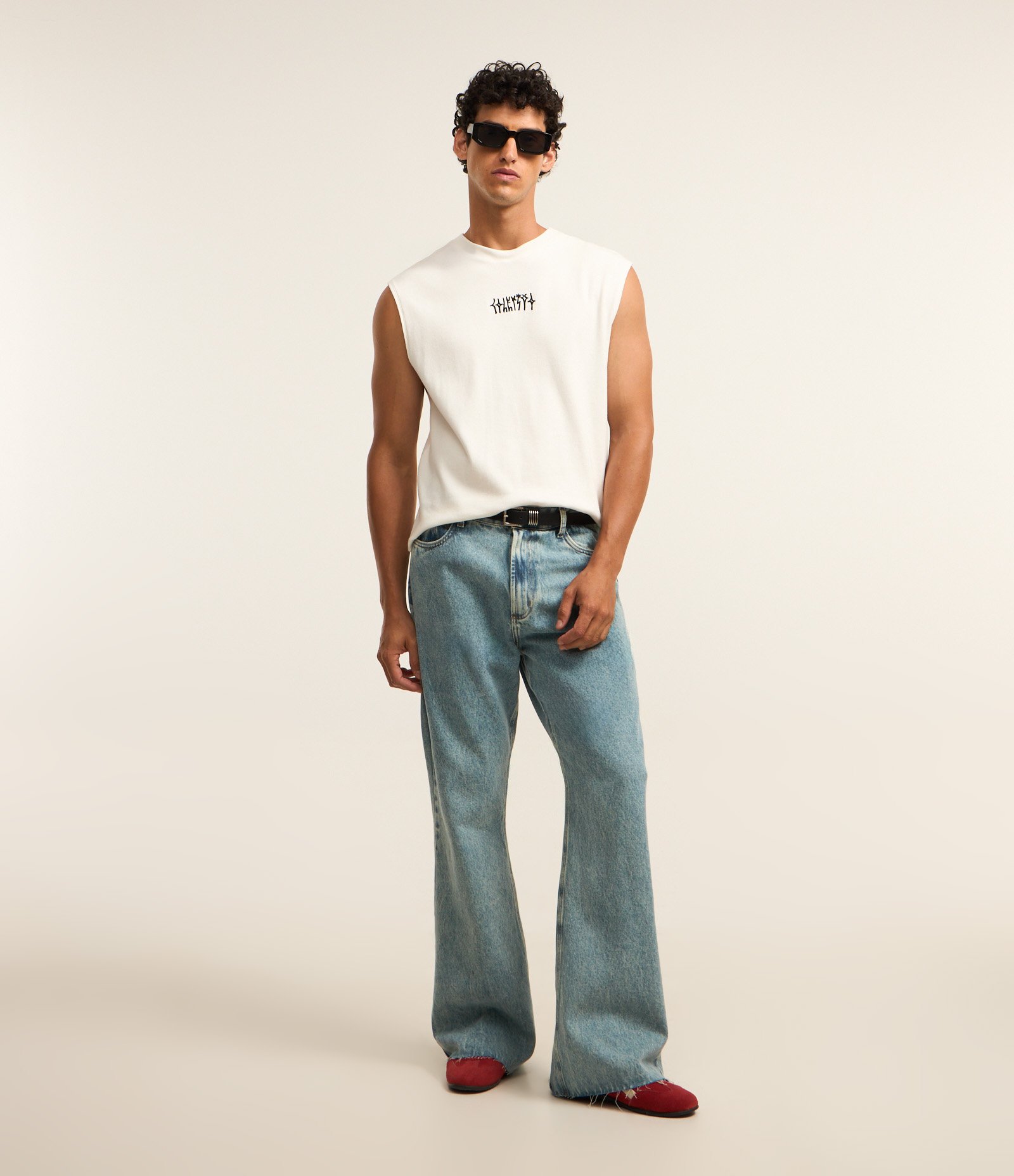 Calça Flare em Jeans com Lavagem Dirty Azul 1