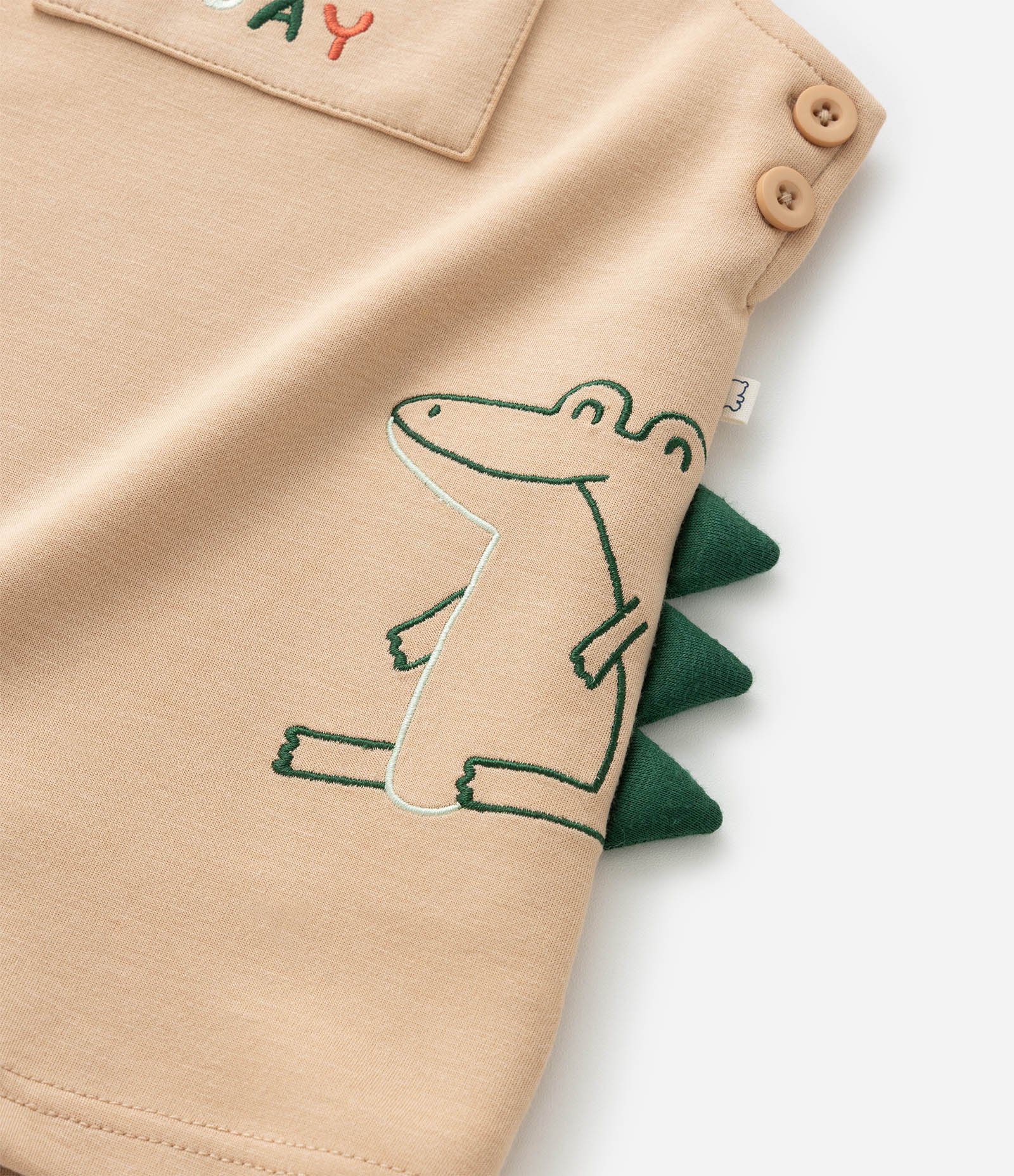 Jardineira Infantil com Bordado Dino e Cristas - Tam 3 a 18 meses Bege 7