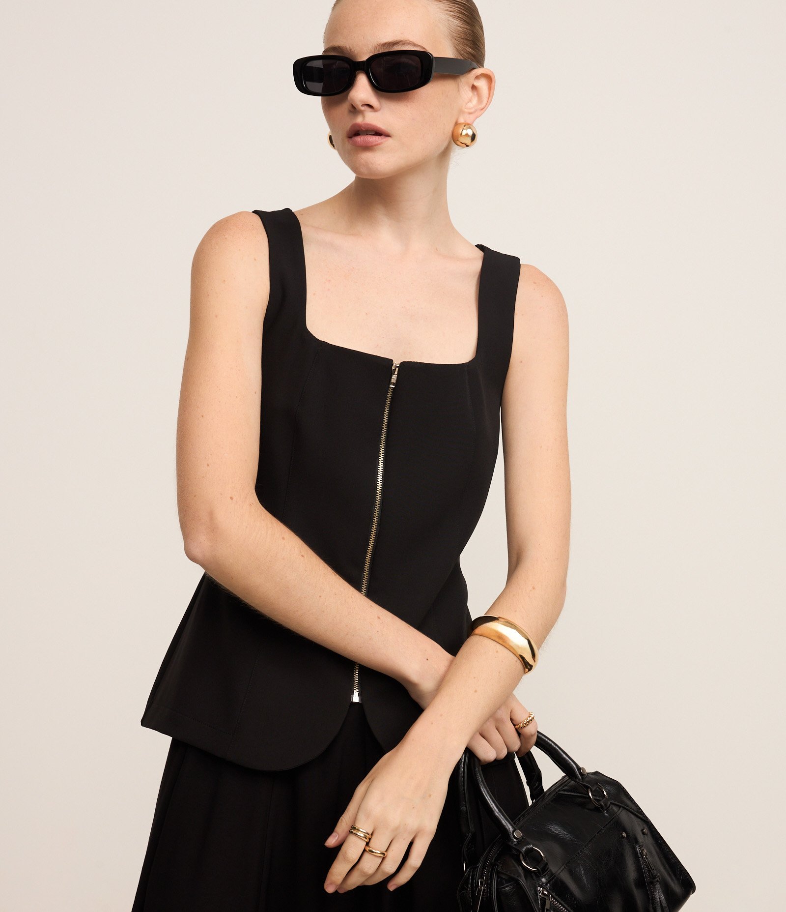 Blusa Alongada em Alfaiataria com Zíper e Barra Arredondada Preto 1