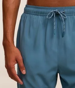 Bermuda Esportiva com Short de Compressão e Bolso Funcional